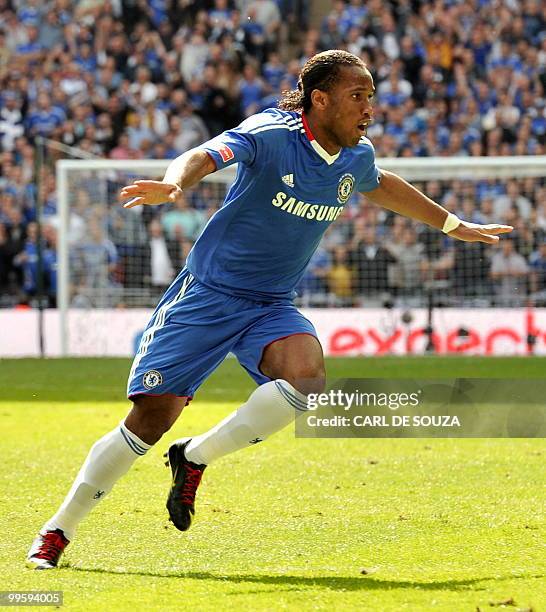 Chelsea's Ivorian striker Didier Drogba celebrates after scoring his team's first goal against Portsmouth during the FA Cup Final football match at...