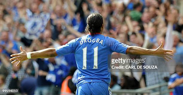 Chelsea's Ivorian striker Didier Drogba celebrates after scoring his team's first goal against Portsmouth during the FA Cup Final football match at...
