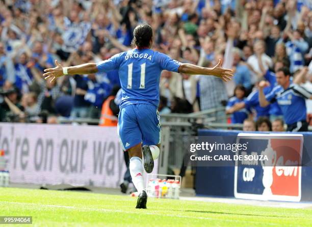 Chelsea's Ivorian striker Didier Drogba celebrates after scoring his team's first goal against Portsmouth during the FA Cup Final football match at...