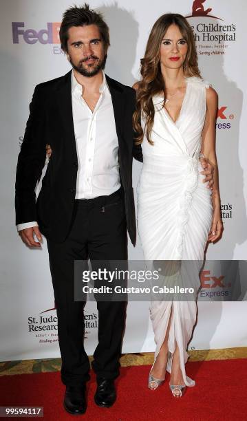 Juanes and Karen Martinez arrive at the 8th Annual FedEx and St. Jude Angels and Stars Gala at InterContinental Hotel on May 15, 2010 in Miami,...