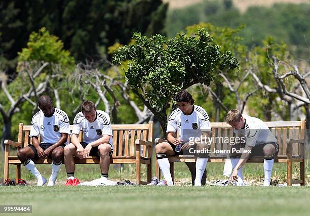 Cacau, Lukas Podolski, Sami Khedira and Toni Kroos of Germany are pictured after the German National Team training session at Verdura Golf and Spa...
