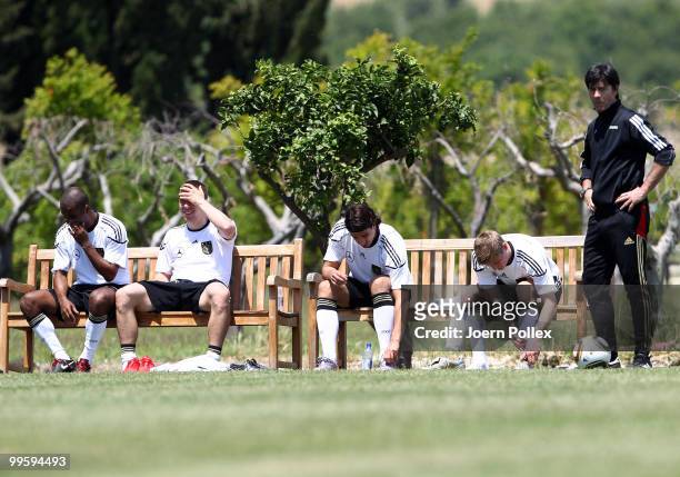 Head coach Joachim Loew , Cacau, Lukas Podolski, Sami Khedira and Toni Kroos of Germany are pictured after the German National Team training session...