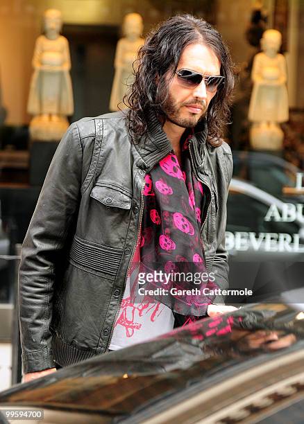 Russell Brand leaves Claridges Hotel before the wedding of David Walliams and Lara Stone at Claridge's Hotel on May 16, 2010 in London, England.