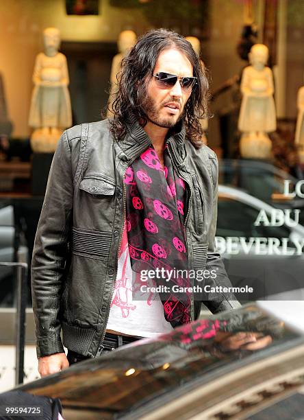 Russell Brand leaves Claridges Hotel before the wedding of David Walliams and Lara Stone at Claridge's Hotel on May 16, 2010 in London, England.