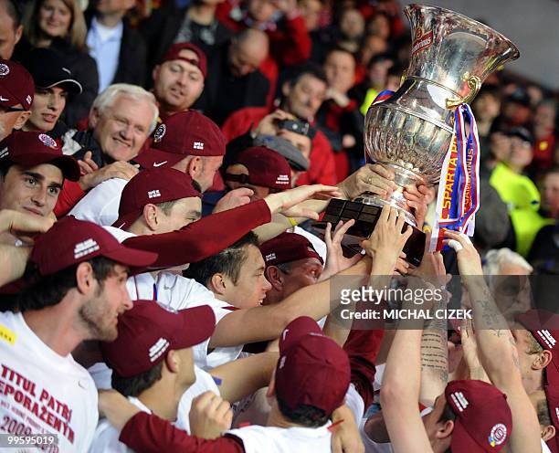 Sparta Prague's football squad celebrate winning first place in the Czech Republic football league on May 15, 2010 at the Generali Arena, in Prague....