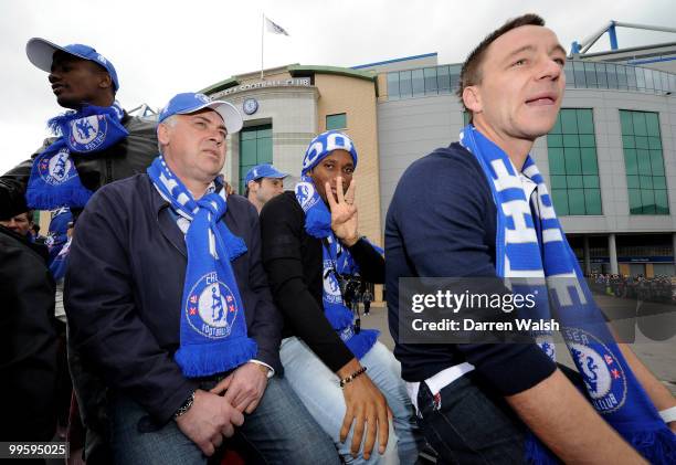 Chelsea Manager Carlo Ancelotti, Didier Drogba and John Terry enjoy the Chelsea Football Club Victory Parade on May 16, 2010 in London, England.