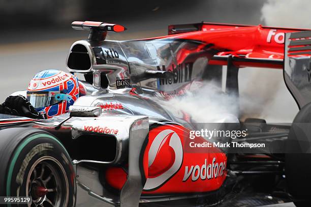 Jenson Button of Great Britain and McLaren Mercedes retires early with an engine problem during the Monaco Formula One Grand Prix at the Monte Carlo...