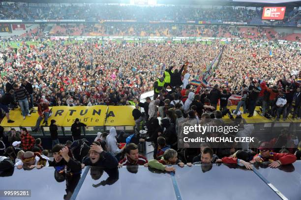 Sparta Prague fans celebrate as their team wins first place in the Czech Republic football league on May 15, 2010 after Sparta Prague defeated FK...