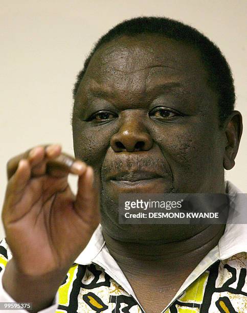 Zimbabwean Prime Minister Morgan Tsvangirai speaks during a press conference at his party's headquarters in Harare on May 16, 2010. Tsvangirai...
