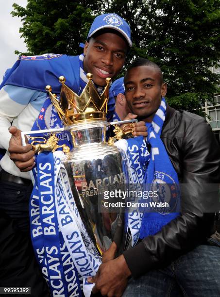 Daniel Sturridge and Salomon Kalou of Chelsea pose with the Premier League trophy during the Chelsea Football Club Victory Parade on May 16, 2010 in...