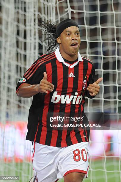 Milan's Brazilian forward Ronaldinho celebrates after scoring against Juventus Turin during their Italian Serie A football match at San Siro Stadium...