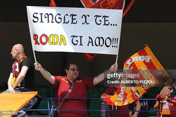 Roma supporters hold a banner reading "Roma I love you" prior their team's Italian serie A football match Chievo vs AS Roma, at Marc'Antonio...