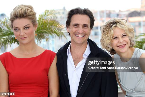 Director Lucy Walker, producer Lawrence Bender and actress Meg Ryan attend the 'Countdown to Zero' Photo Call held at the Palais des Festivals during...