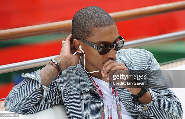 Pharrell Williams talks on his mobile phone at the Red Bull Formula 1 Energy Station on May 16, 2010 in Monaco, France.