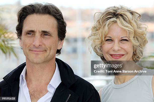 Producer Lawrence Bender and actress Meg Ryan attend the 'Countdown to Zero' Photo Call held at the Palais des Festivals during the 63rd Annual...