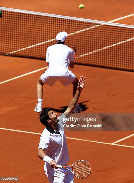 Daniel Nestor of Canada and Nenad Zimonjic of Serbia in action against Mike Bryan and Bob Bryan of the USA in the mens doubles final match during the...