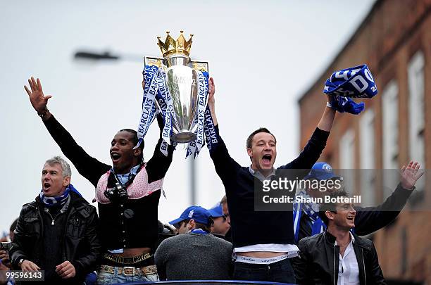 Chelsea captain John Terry and Didier Drogba celebrate with the Premier League Trophy during the Chelsea FC Victory Parade on May 16, 2010 in London,...