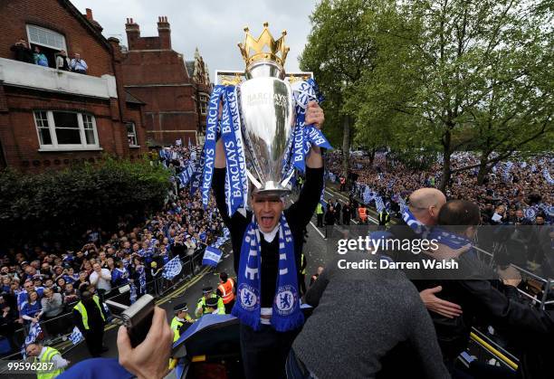 John Terry of Chelsea poses with the Premier League trophy during the Chelsea Football Club Victory Parade on May 16, 2010 in London, England.