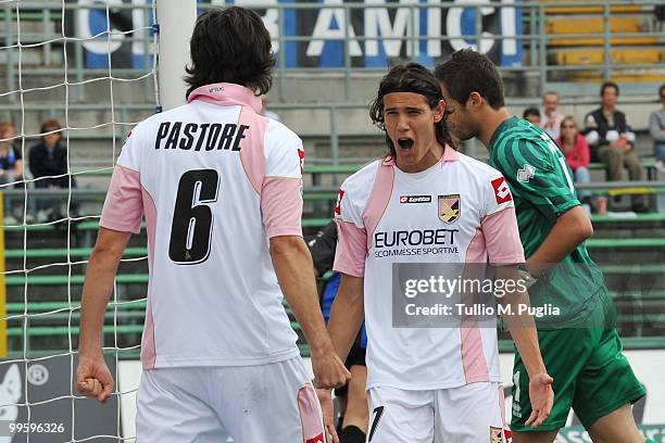 Edinson Cavani of Palermo celebrates the opening goal with his team mate Javier Pastore during the Serie A match between Atalanta BC and US Citta di...