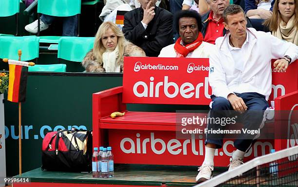 National coach Patrick Kuehnen of Germany and Roberto Blanco look on during day one of the ARAG World Team Cup at the Rochusclub on May 16, 2010 in...