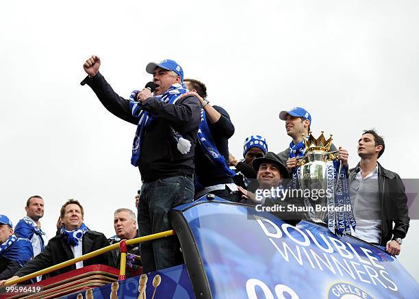 Carlo Ancelotti the Chelsea coach sings to the crowd during the Chelsea FC Victory Parade on May 16, 2010 in London, England.