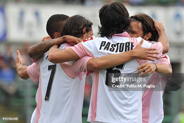 Edinson Cavani of Palermo celebrates the opening goal with his team mates Abel Hernandez and Javier Pastore and Nicolas Bertolo during the Serie A...