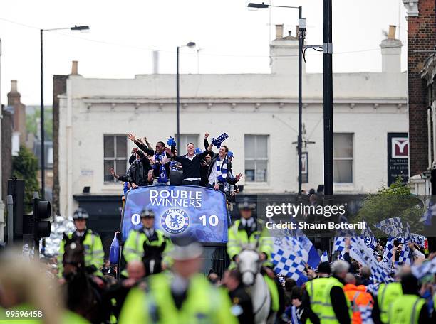 Chelsea captain John Terry, Didier Drogba and Frank Lampard celebrate during the Chelsea FC Victory Parade on May 16, 2010 in London, England.