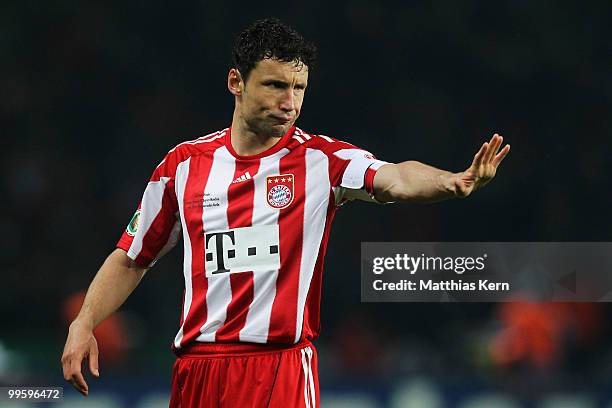 Mark van Bommel of Bayern gestures during the DFB Cup final match between SV Werder Bremen and FC Bayern Muenchen at Olympic Stadium on May 15, 2010...