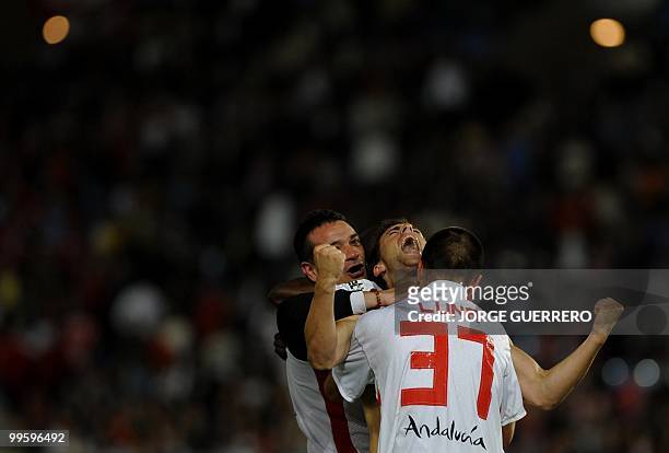 Sevilla's Rodri celebrates with teammates after scoring against Almeria during a Spanish league football match at Juegos del Mediterraneo stadium on...