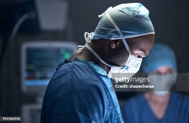 his surgeries follow a high success rate - africa hospital stock pictures, royalty-free photos & images