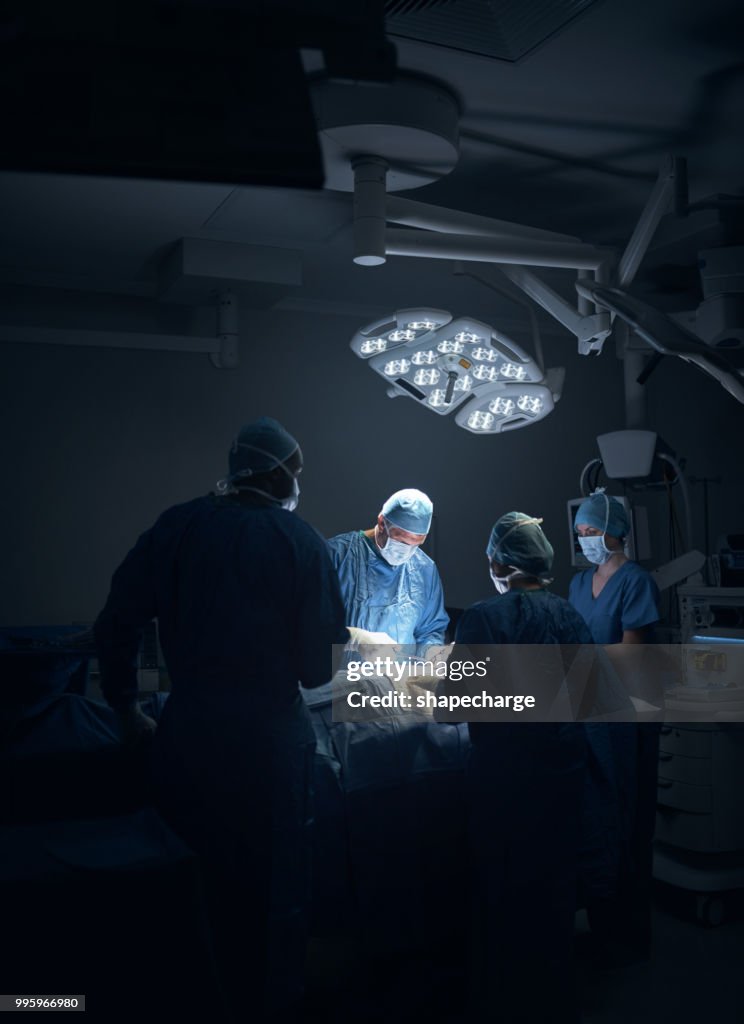 Gathered around to make it yet another successful surgery