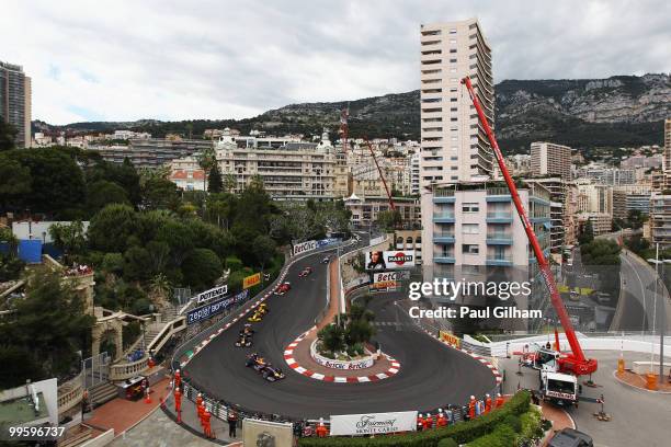 Mark Webber of Australia and Red Bull Racing leads the field round the hairpin on the first lap of the Monaco Formula One Grand Prix at the Monte...