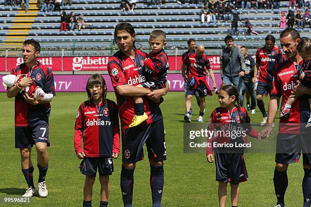 Andrea Cossu, Danielel Conti and Alessandro Agostini of Cagliari Cossu are pictured during the Serie A match between Cagliari Calcio and Bologna FC...