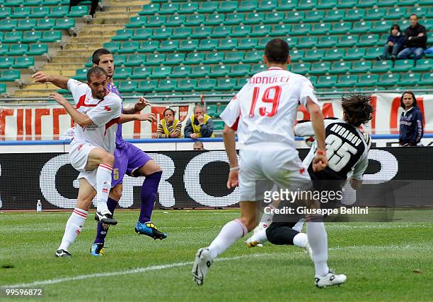 Cristian Stellini scores the opening goal during the Serie A match between AS Bari and ACF Fiorentina at Stadio San Nicola on May 16, 2010 in Bari,...