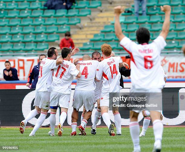 Bari players celebrate Cristian Stellini's opening goal during the Serie A match between AS Bari and ACF Fiorentina at Stadio San Nicola on May 16,...