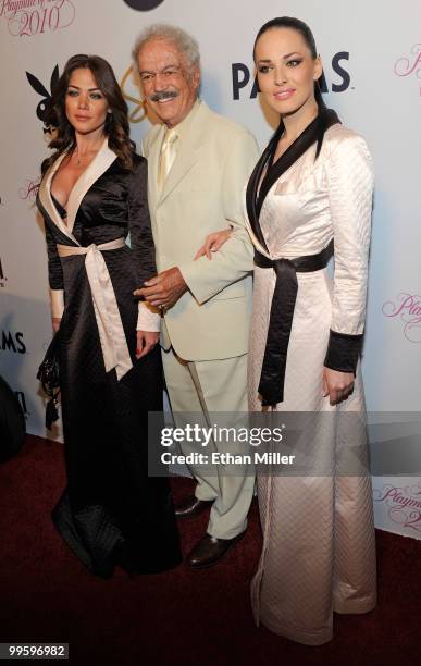 Singer Julia Kavtaradze and Playboy Playmate and singer Dasha Astafieva of the Ukrainian pop music group NikitA flank Hugh Hefner's brother Keith...