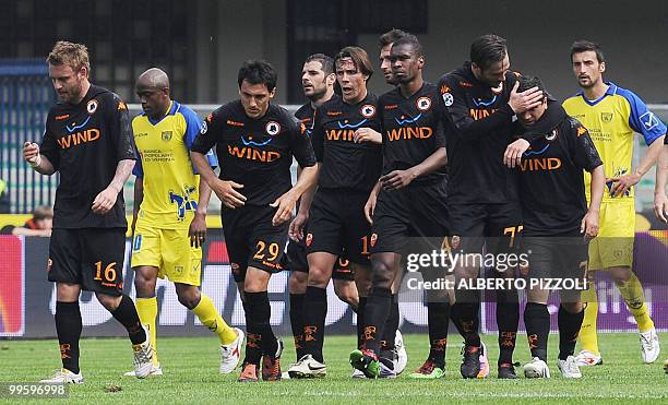 Roma's players celebrates the goal scored by AS Roma's Chilean midfielder David Marcelo Cortes Pizarro during their Italian serie A football match...