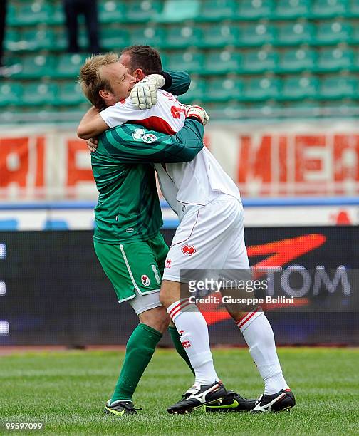 Jean Francois Gillet and Cristian Stellini celebrate Cristian Stellini's opening goal during the Serie A match between AS Bari and ACF Fiorentina at...