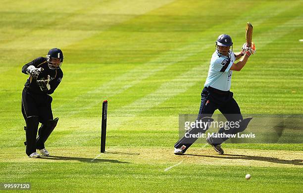 Robert Key of Kent edges the ball towards the boundary, as Tim Ambrose of Warwickshire looks on during the Clydesdale Bank 40 match betwen...