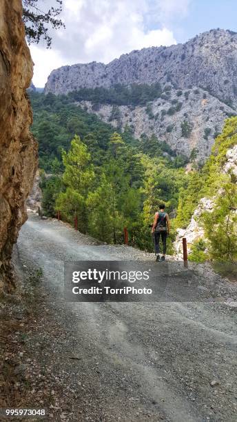woman on trail on goynuk canyon antalya - kemer stock-fotos und bilder