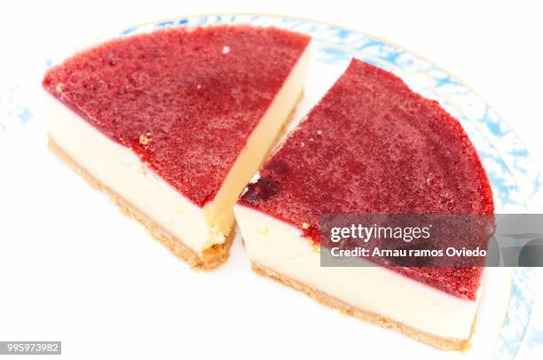 cheesecake with strawberry syrup - strawberry syrup stock pictures, royalty-free photos & images