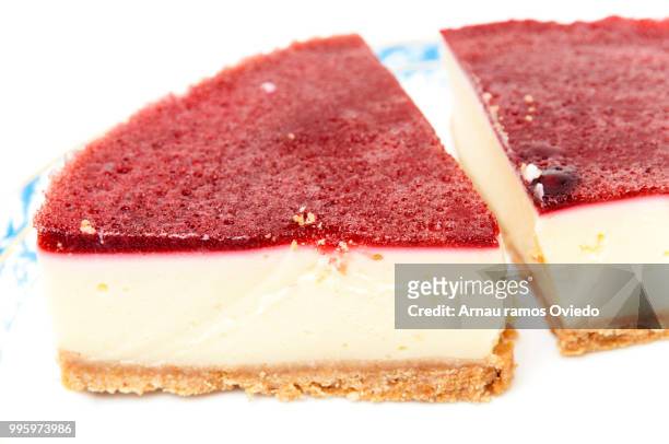 cheesecake with strawberry syrup - strawberry syrup stock pictures, royalty-free photos & images