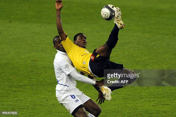 Auxerre's Malian defender Adama Coulibaly vies FC Sochaux' nigerian forward Ideye Brown during the French L1 football match Sochaux vs. Auxerre on...