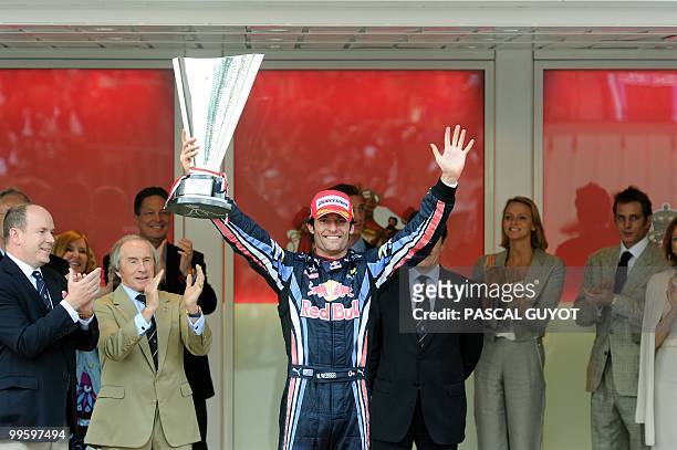 Red Bull's Australian driver Mark Webber celebrates on the podium of the Monaco street circuit on May 16 after the Monaco Formula One Grand Prix. Red...