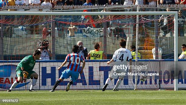 Maximiliano Maxi Lopez of Catania Calcio scores his goal during the Serie A match between Catania Calcio and Genoa CFC at Stadio Angelo Massimino on...