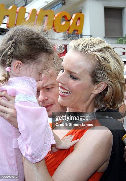 Model Eva Herzigova stands outside at her hotel on May 16, 2010 in Cannes, France.