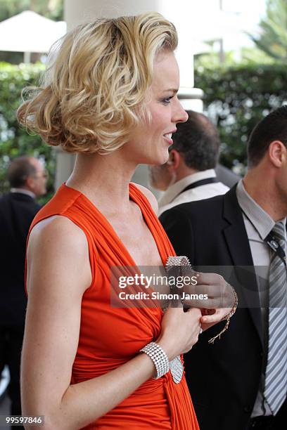 Model Eva Herzigova stands outside at her hotel on May 16, 2010 in Cannes, France.