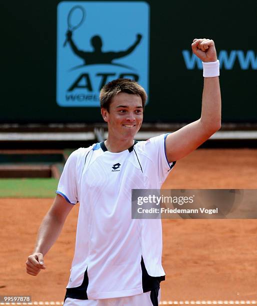 Andreas Beck of Germany celebrates after winning his match against Paul-Henri Mathieu of France during day one of the ARAG World Team Cup at the...