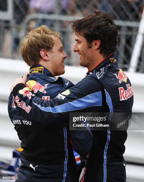 Race winner Mark Webber of Australia and Red Bull Racing celebrates with second placed team mate Sebastian Vettel of Germany and Red Bull Racing...