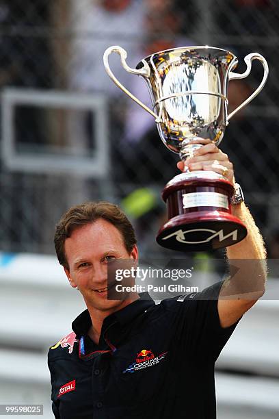 Red Bull Racing Team Principal Christian Horner celebrate with the winning constructors trophy following the Monaco Formula One Grand Prix at the...